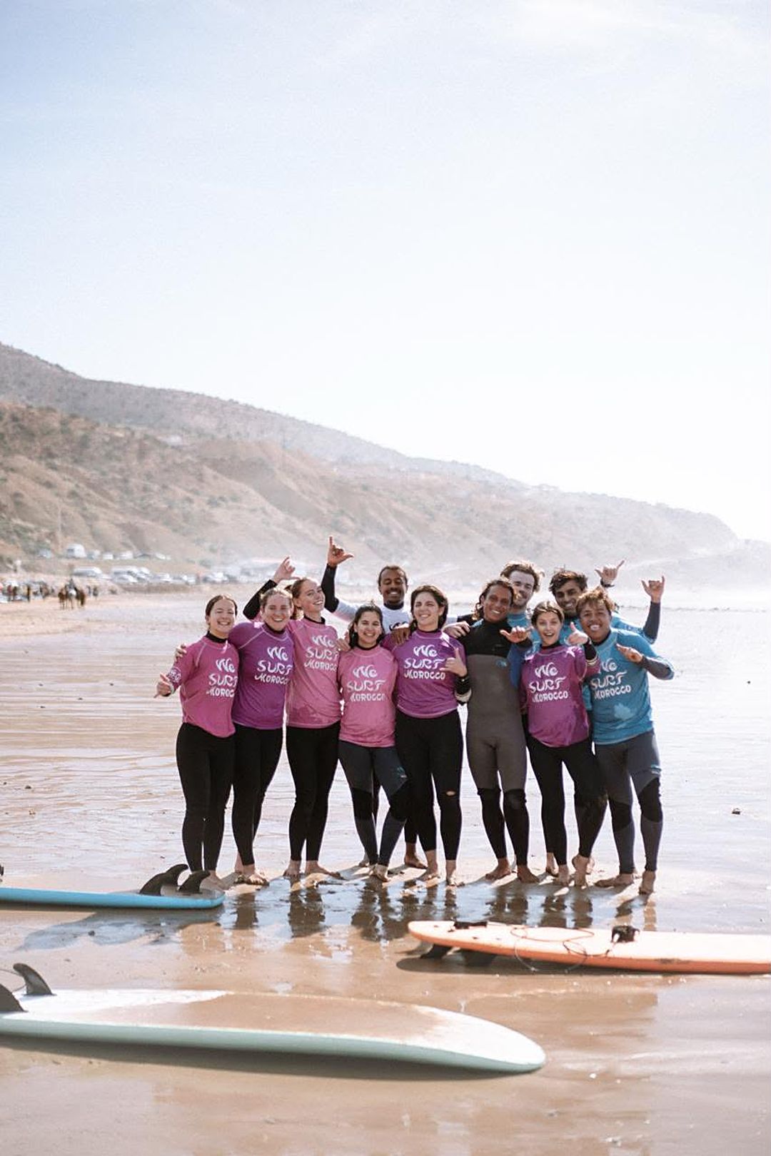 The We Surf Morocco crew on the beach in Taghazout, Maroc