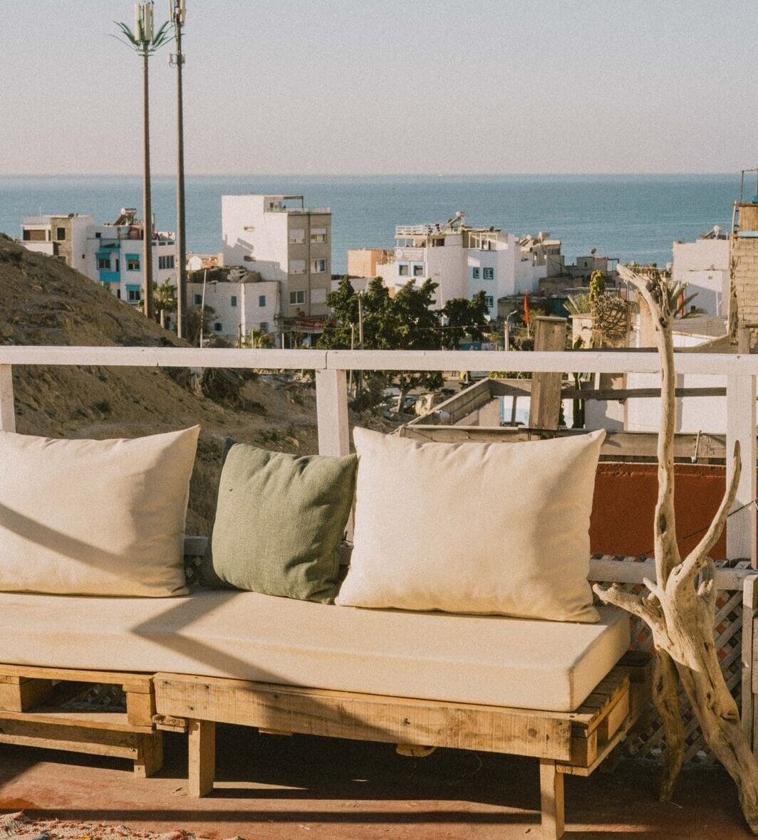 The surf house rooftop overlooking Taghazout village and the ocean